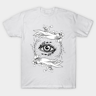 Third eye mystical symbol with woman hands and cute flowers. T-Shirt